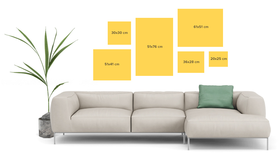 Canvas Prints Hung Above a Couch in Various Sizes